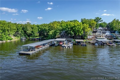Welcome to this 3-bedroom, 2-bathroom home in Sunrise Beach, MO - photo 28