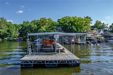 Welcome to this 3-bedroom, 2-bathroom home in Sunrise Beach, MO - photo 31