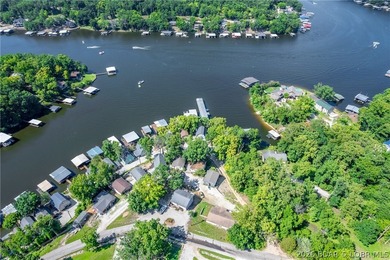 Welcome to this 3-bedroom, 2-bathroom home in Sunrise Beach, MO - photo 34