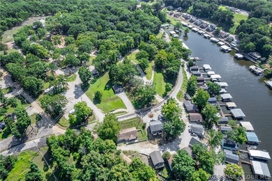 Welcome to this 3-bedroom, 2-bathroom home in Sunrise Beach, MO - photo 35