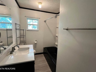 Discover tranquil living in this spacious 3-bedroom, 2-bathroom - photo 13