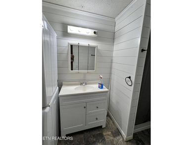 Discover tranquil living in this spacious 3-bedroom, 2-bathroom - photo 15