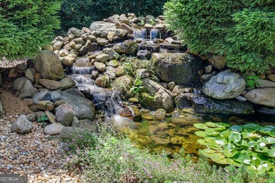 Welcome to this exceptional four-bedroom, four and a half bath - photo 46