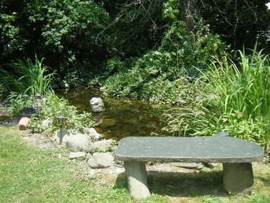 Want a little piece of history set on a wide tranquil lot? This - photo 7