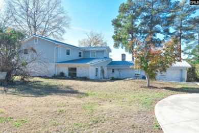 Lake Home For Sale in Gilbert, South Carolina