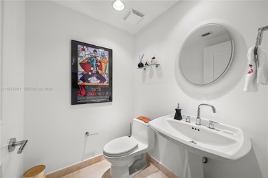 Exclusive Island Living! Welcome to a rare 3-bedroom oceanfront