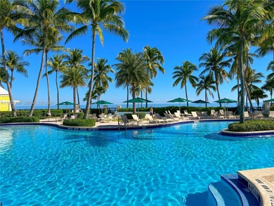 Exclusive Island Living! Welcome to a rare 3-bedroom oceanfront