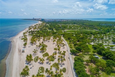 Exclusive Island Living! Welcome to a rare 3-bedroom oceanfront