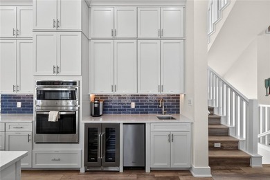 Experience luxury coastal living in this multi-level beach - photo 4