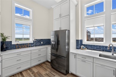 Experience luxury coastal living in this multi-level beach - photo 5