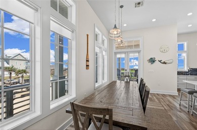 Experience luxury coastal living in this multi-level beach - photo 6