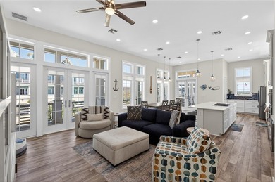 Experience luxury coastal living in this multi-level beach - photo 8