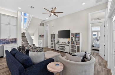 Experience luxury coastal living in this multi-level beach - photo 9