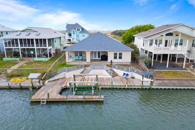 This canal front home in Bahia Bay is the perfect fishing - photo 1