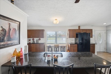Welcome home to this beautifully maintained and thoughtfully - photo 14