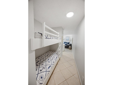 Welcome to this charming ground floor Gulfview condo. Such - photo 11