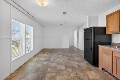 This new home is located in Palm Haven an all-age Community here - photo 3