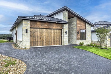 LOCK AND LEAVE CUSTOM HOME IN THE VILLA SECTION OF TUSCAN - photo 2