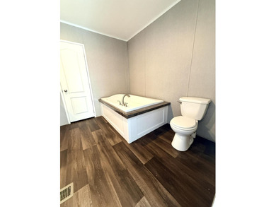 Discover this spacious 5-bedroom, 3-bath Clayton home on 15.4