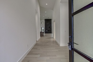 LOCK AND LEAVE CUSTOM HOME IN THE VILLA SECTION OF TUSCAN - photo 4