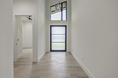 LOCK AND LEAVE CUSTOM HOME IN THE VILLA SECTION OF TUSCAN - photo 5