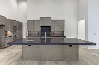LOCK AND LEAVE CUSTOM HOME IN THE VILLA SECTION OF TUSCAN - photo 7