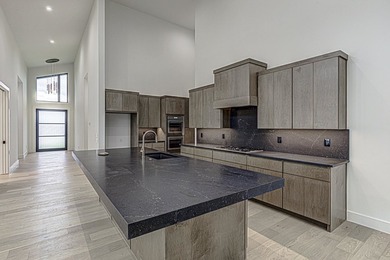 LOCK AND LEAVE CUSTOM HOME IN THE VILLA SECTION OF TUSCAN - photo 8