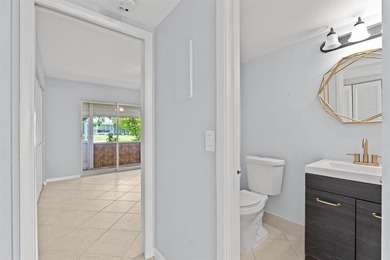 Beautifully Updated Ground Floor Unit. 1 Bedroom, 1 1/2 Baths - photo 11