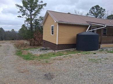 This 1000 sq ft home has 2 bed 2 bath and sits on 14.5 acres - photo 1