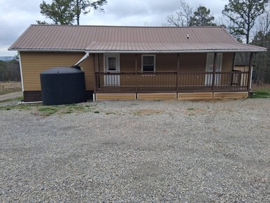 This 1000 sq ft home has 2 bed 2 bath and sits on 14.5 acres - photo 4