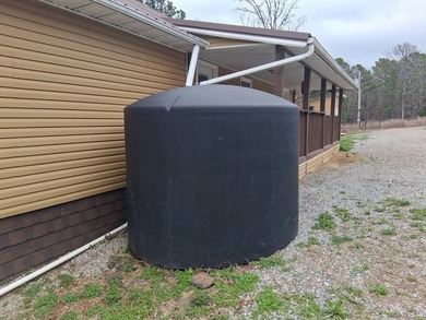 This 1000 sq ft home has 2 bed 2 bath and sits on 14.5 acres - photo 7