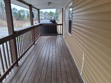 This 1000 sq ft home has 2 bed 2 bath and sits on 14.5 acres - photo 9
