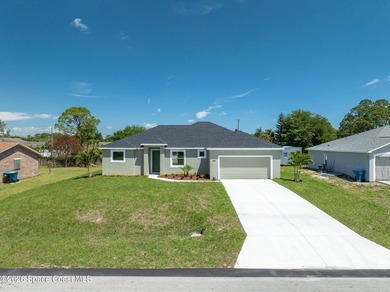 New Construction Custom Home in Desirable Port Malabar Unit 50 - photo 2