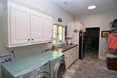 Stunning Remodeled Main Channel Waterfront Home boasting 209+/- - photo 21
