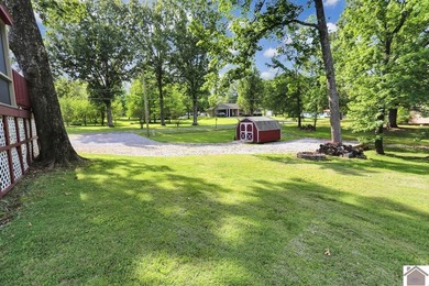 Enjoy lake living in this spacious 4 bedroom, 2 bath home - photo 14