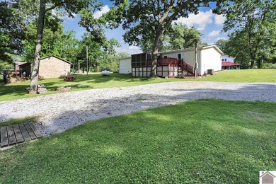 Enjoy lake living in this spacious 4 bedroom, 2 bath home - photo 16