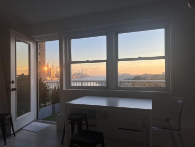 Prestigious Boulevard East top floor unit with breathtaking NYC