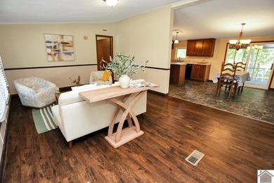 Enjoy lake living in this spacious 4 bedroom, 2 bath home - photo 17