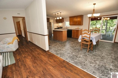 Enjoy lake living in this spacious 4 bedroom, 2 bath home - photo 18