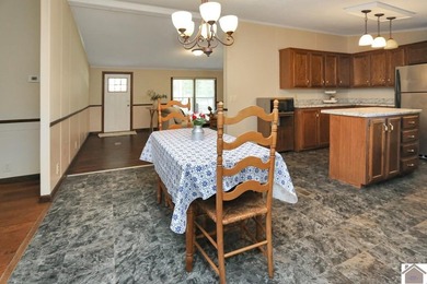 Enjoy lake living in this spacious 4 bedroom, 2 bath home - photo 20