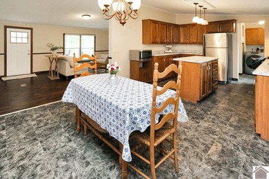 Enjoy lake living in this spacious 4 bedroom, 2 bath home - photo 21