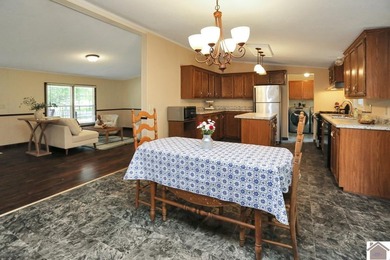 Enjoy lake living in this spacious 4 bedroom, 2 bath home - photo 22