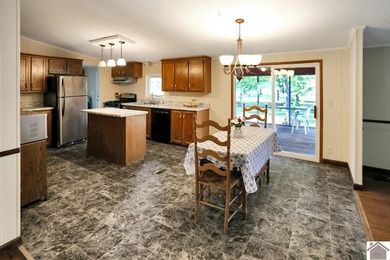 Enjoy lake living in this spacious 4 bedroom, 2 bath home - photo 23