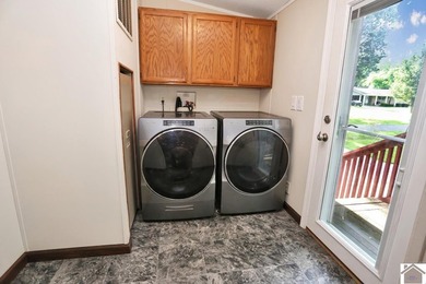 Enjoy lake living in this spacious 4 bedroom, 2 bath home - photo 25
