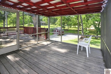 Enjoy lake living in this spacious 4 bedroom, 2 bath home - photo 26