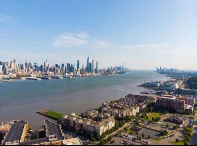 Prestigious Boulevard East top floor unit with breathtaking NYC