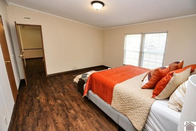 Enjoy lake living in this spacious 4 bedroom, 2 bath home - photo 27