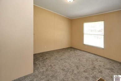 Enjoy lake living in this spacious 4 bedroom, 2 bath home - photo 34