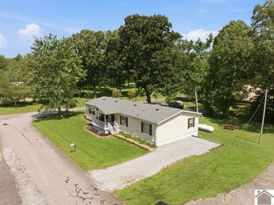 Enjoy lake living in this spacious 4 bedroom, 2 bath home - photo 36