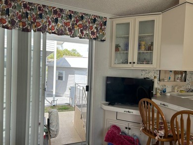 Furnished Park Model with addition, RV hookups and newer golf - photo 8